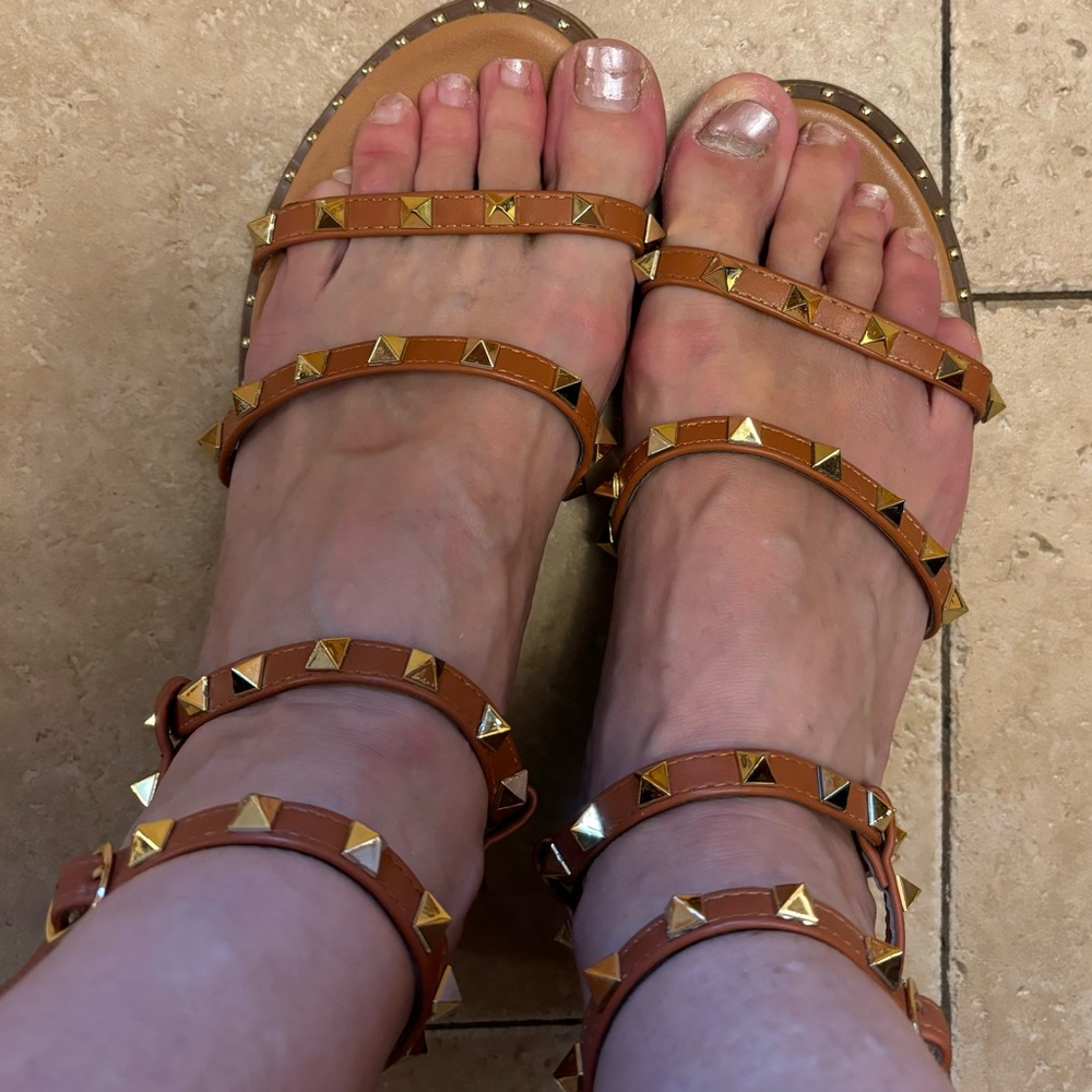 Madden Girl gladiator style sandles with gold studs. Size 9